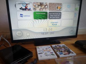 Nintendo Wii Black Edition mit Motion Plus Adapter Spiel und Balance Board