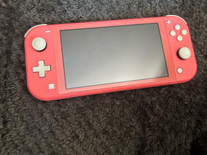 Nintendo Switch lite Coral Animal Crossing Edition