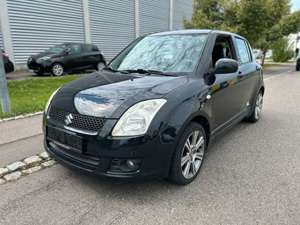 Suzuki Swift Lim. Black and White