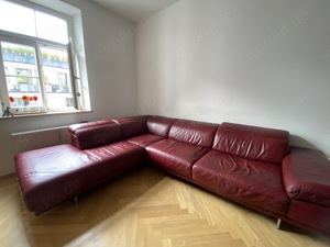 Leder-Couchgarnitur NATUZZI L-Form weinrot   Ottomane links