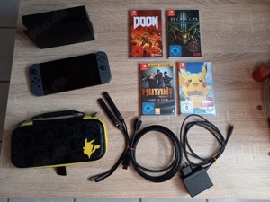 Verkaufe Nintendo Switch OLED + Spiele + Zubehör 