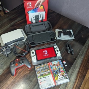 Nintendo Switch OLED + 2 Spiele