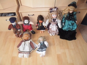 7 Sammlerpuppen  mit Kleider  