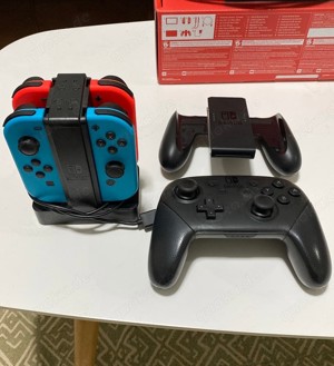 Nintendo Switch 4 joycon + 5 Spiele Bild 3