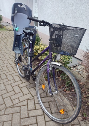 Damenfahrrad mit Kindersitz