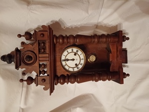 Antike Holzwanduhr