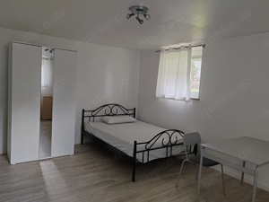 Einliegerwohnung möbiliert in gehobener und ruhiger Wohnlage  