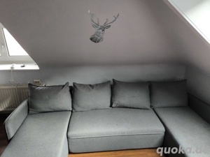 Wohnlandschaft mit Bett-Funktion 