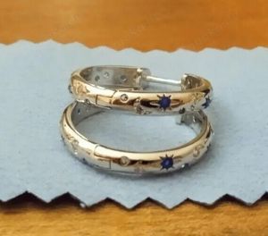 Creolen mit Mond-Sternmotiv und weiß blauem Zirkonia 