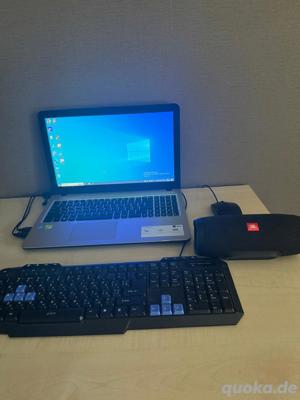 Asus F540M laptop mit Tastatur und Maus