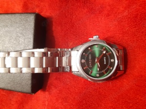 neue silberfarbene Armbanduhr mit grünem Zifferblatt Bild 3
