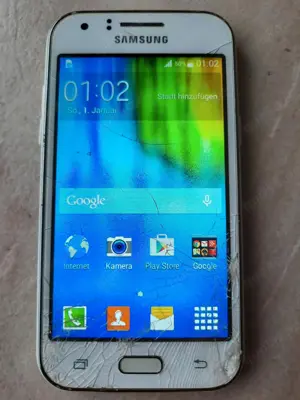 Samsung Galaxy J1 weiß technisch sehr guter Zustand Glasschaden Bild 2