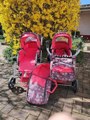 2 Puppenwagen mit Zubehör 
