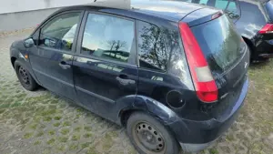 Ford Fiesta 1.4 Ghia Export Bild 2