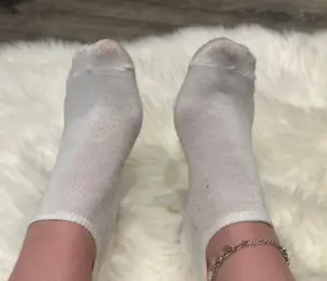 Getragene Socken von 21-jähriger 