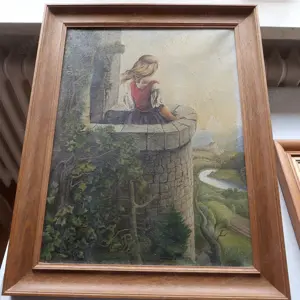 Bild junges Mädchen auf dem Burgbalkon