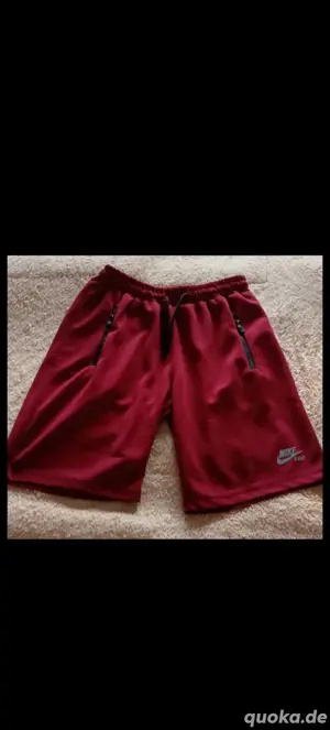 Vend short rouge Nike taille M