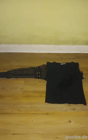 Verkaufe guterhaltenes Oberteil  Bild 1