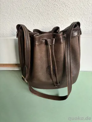 Yves Saint Laurent Bucket Tische