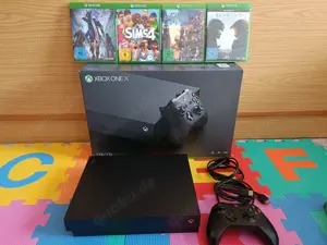 Microsoft Xbox One X (1 TB) mit 7 Spielen, Wie Neu Bild 2