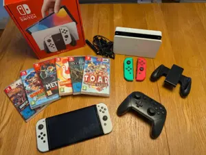 Nintendo Switch OLED + Spiele
