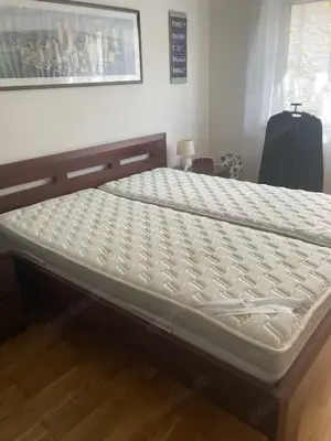 Doppelbett aus schönem Massivholz mit 2 Matrazen