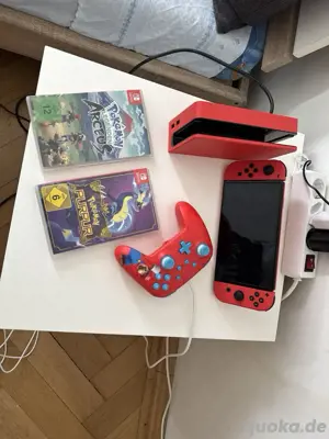 Nintendo switch OLED Modell Rot mit controller + 2 spiele 