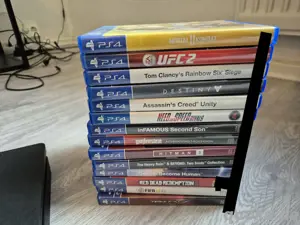 Playstation 4 Slim + 14 Spiele,2 controller und doppelauflader