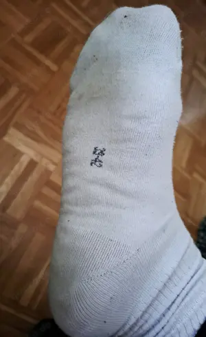 Getragene, verschwitzte Socken
