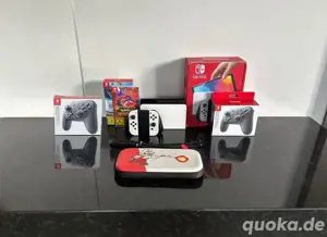 Nintendo Switch Oled mit 2 Spielen 2 Pro Controller und Tasch