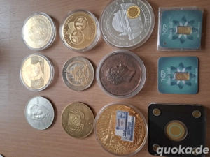 Echt Goldmünze und Goldbarren sowie andere Medallien 