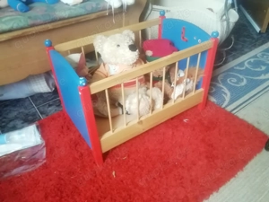 Puppenbett mit inhalt