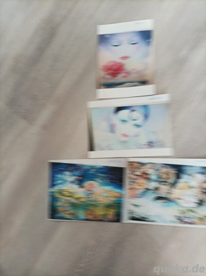 4 verschieden große neue Puzzle nur zusammen 