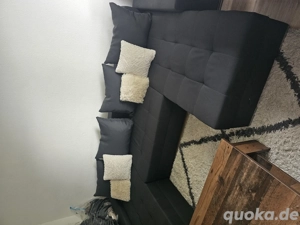 sofa mit bettfuncktion  und wohnwand 