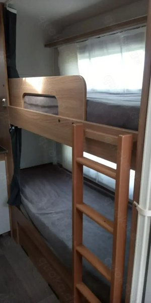 Wohnwagen Bürstner Premio 530 TK mit Stockbett und Herzog Vorzelt Bild 4