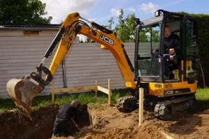 Durchführung von Baggerarbeiten und Erdbewegungen 