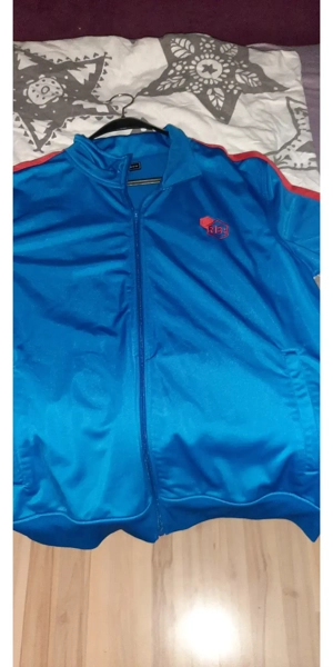 schöne atmungsaktive Sportjacke  Bild 2