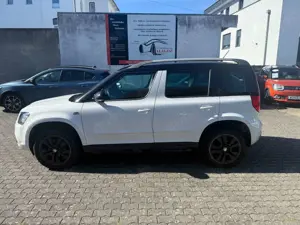 Skoda Yeti YETI 2.0 TDI MONTE CARLO XENON PDC SHZ AHK 1HD Bild 2