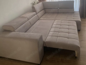 Couch mit Schlaffunktion und Hocker