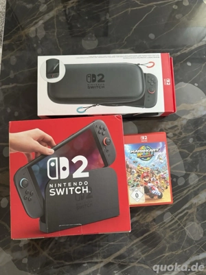 nintendo Switch 2 spiele konsole mit Mario kart World und verpakung 