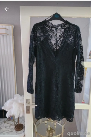 Elegantes Spitzenkleid