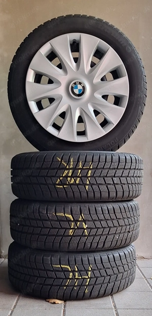 BMW 1er 4 x Winterreifen mit Stahlfelgen 195 55R16 Radzierblenden