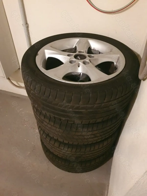 Original 1-er BMW- Alufelgen mit Sommerferien 