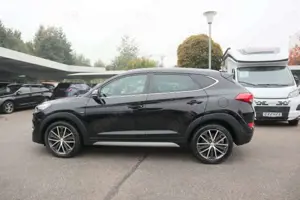 Hyundai TUCSON Tucson Passion + 4WD Navi/Klima/LED/Sitzhzg. BC Bild 4