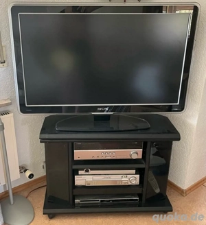 TV-Schränkchen mit Glasplatte zu verschenken