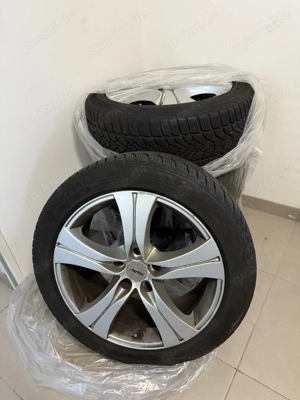 Winterkompletträder auf Alufelgen für BMW X3 mit Alpine Zeichen