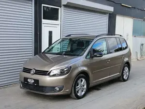 Volkswagen Touran *Garantie*Bi-Xenon*Navi*8-fach bereift*