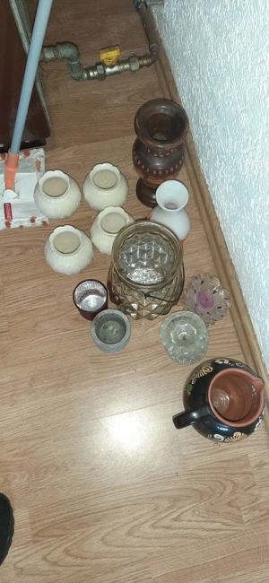 Einige Kerzenhalter aus Bleikristall und Vasen