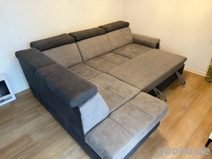 Neuwertiges Ecksofa mit Bettfunktion und Stauraum