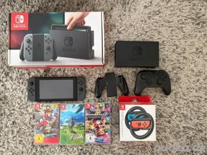 Nintendo switch 1 spielkonsole mit 3 spiel set  inkl. Verpakung + Zubehör packet 